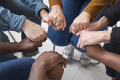 close-up-people-holding-hands-1-scaled